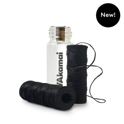 INFUSED FLOSS Oral Care Akamai Infused Black Floss w/Glass Container (2 spools) | 4 mos supply (66 yds) - $16 