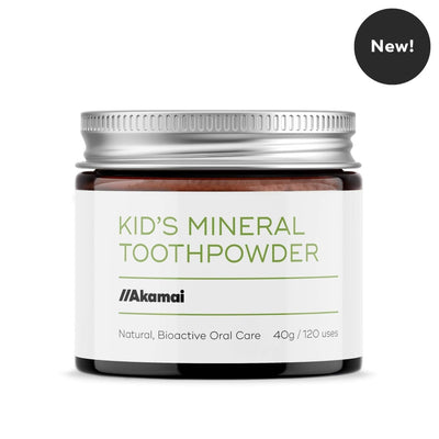 Jar of 'Kid's Mineral Toothpowder' by Akamai on a white background
